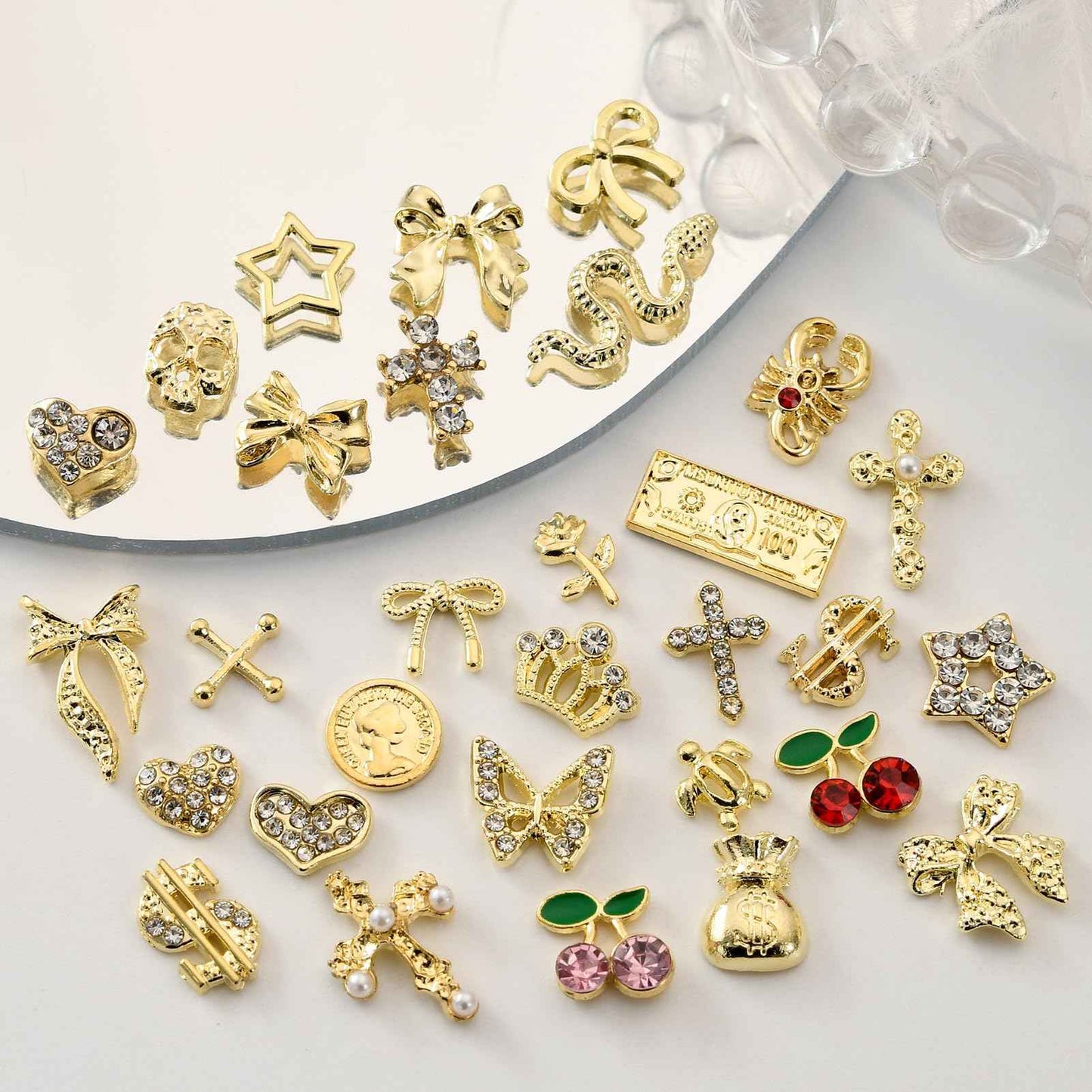 OPMADM 100Pcs Gold Nail Charms and Gems Charms for Nails Design Gold Charms for Nails Metal Bow Cherry Butterfly Cross Heart Star and Flowers