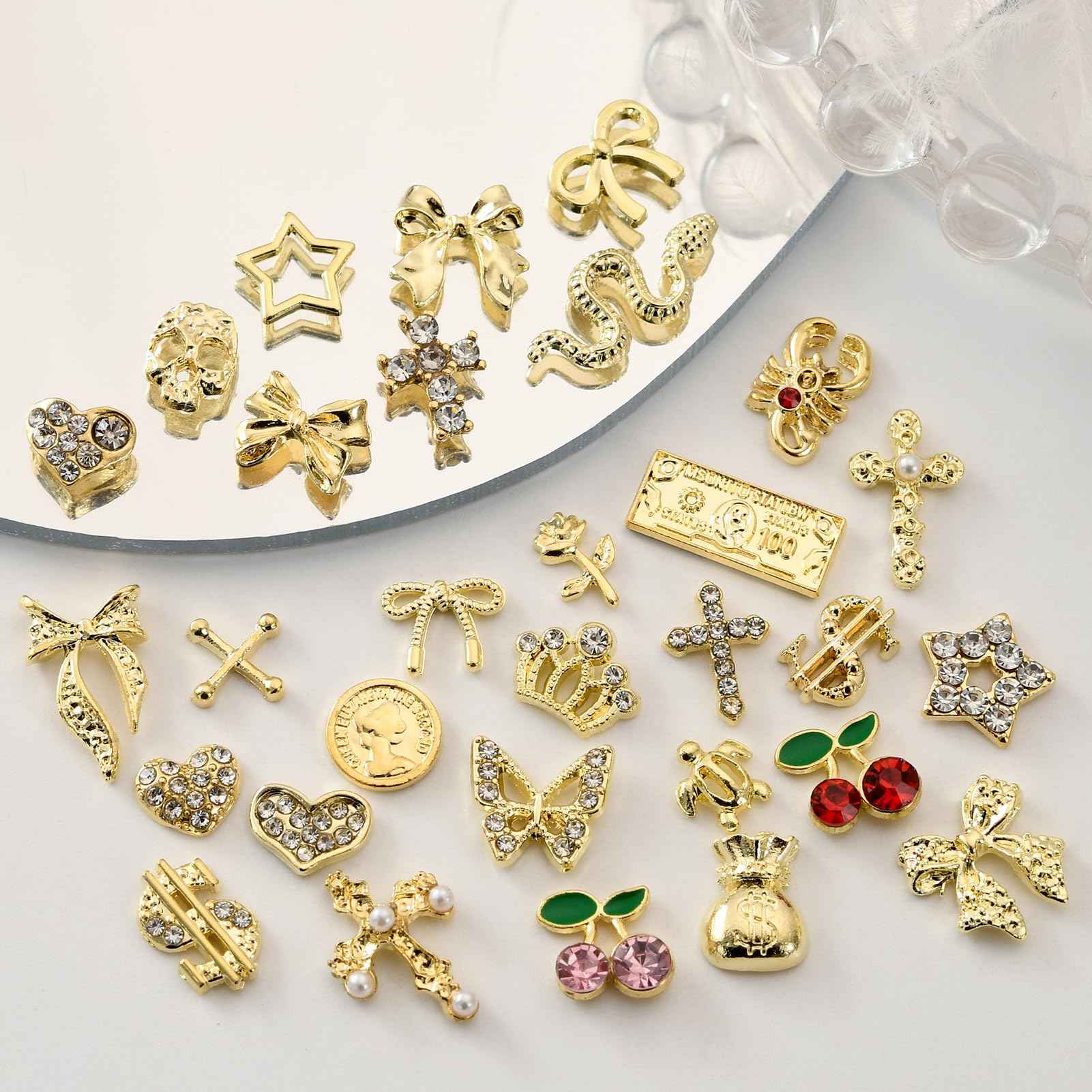 OPMADM 100Pcs Gold Nail Charms and Gems Charms for Nails Design Gold Charms for Nails Metal Bow Cherry Butterfly Cross Heart Star and Flowers