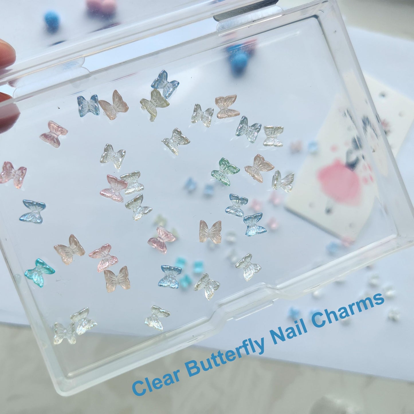 QZRUO 60Pcs Butterfly Nail Charms - Clear Small Cute and Glittery 3D Acrylic Gems for Stunning Nail Art