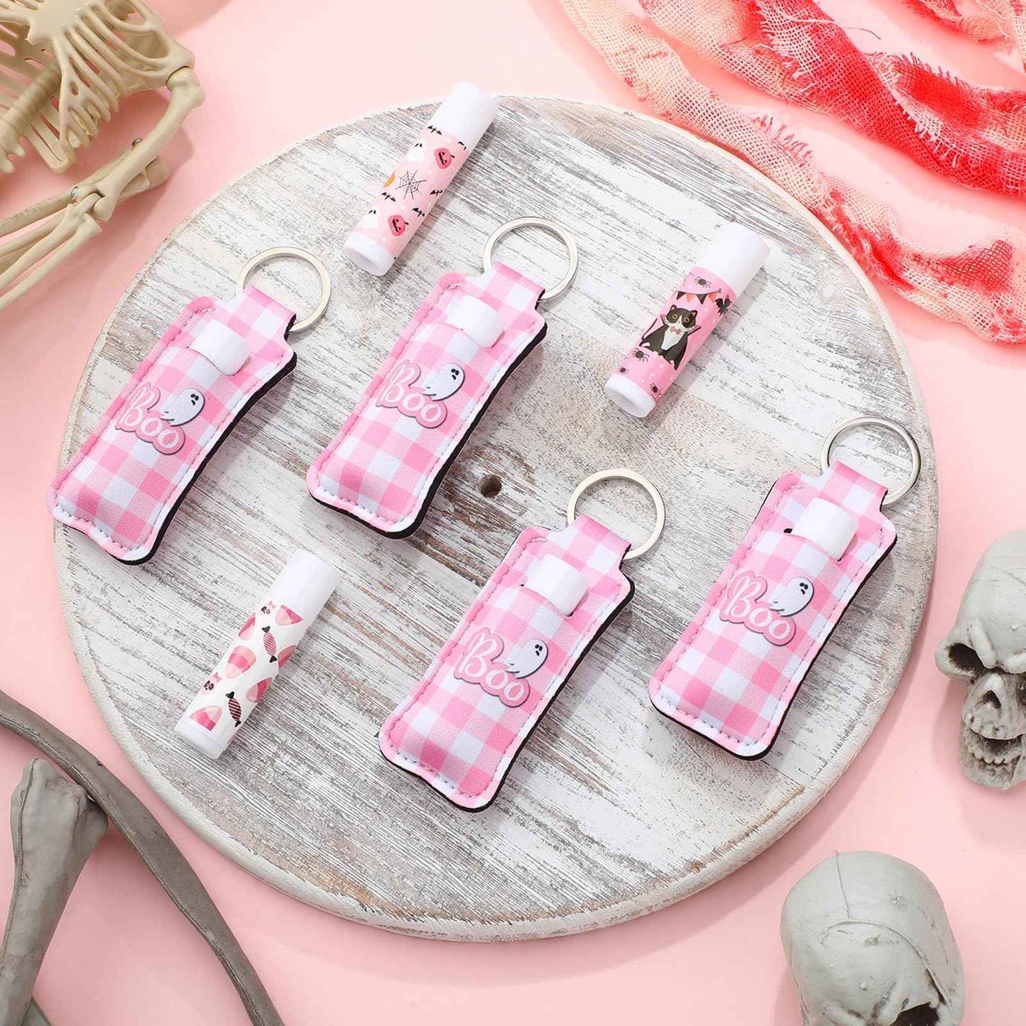 Swiffen 36 Pcs Halloween Lip Balms Gifts Bulk Halloween Party Favors Lip Balm Holder Keychain Spooky Ghost Skull Bat Lipstick Moisturizers for Adults Treat Bags Stuffers Party Supplies(Pink Style)