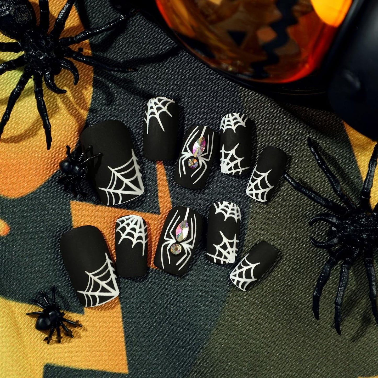 Halloween Press on Nails Medium False Nails with White Spider Web Rhinestones Designs Full Cover Black Acrylic Nails Matte Fake Nails with Nail Glue for Women Girls Nails Supplies