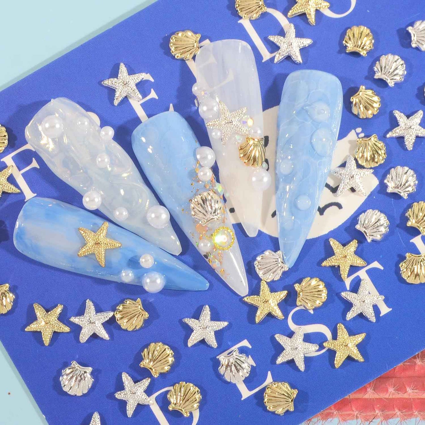 WEILUSI 100PCS Gold Silver Nail Art Charms Ocean Theme Shell Starfish Studs Decals Rivets, Alloy 3D Sea Shell Star Metal Nail Jewelry Supplies for DIY Manicure Decoration