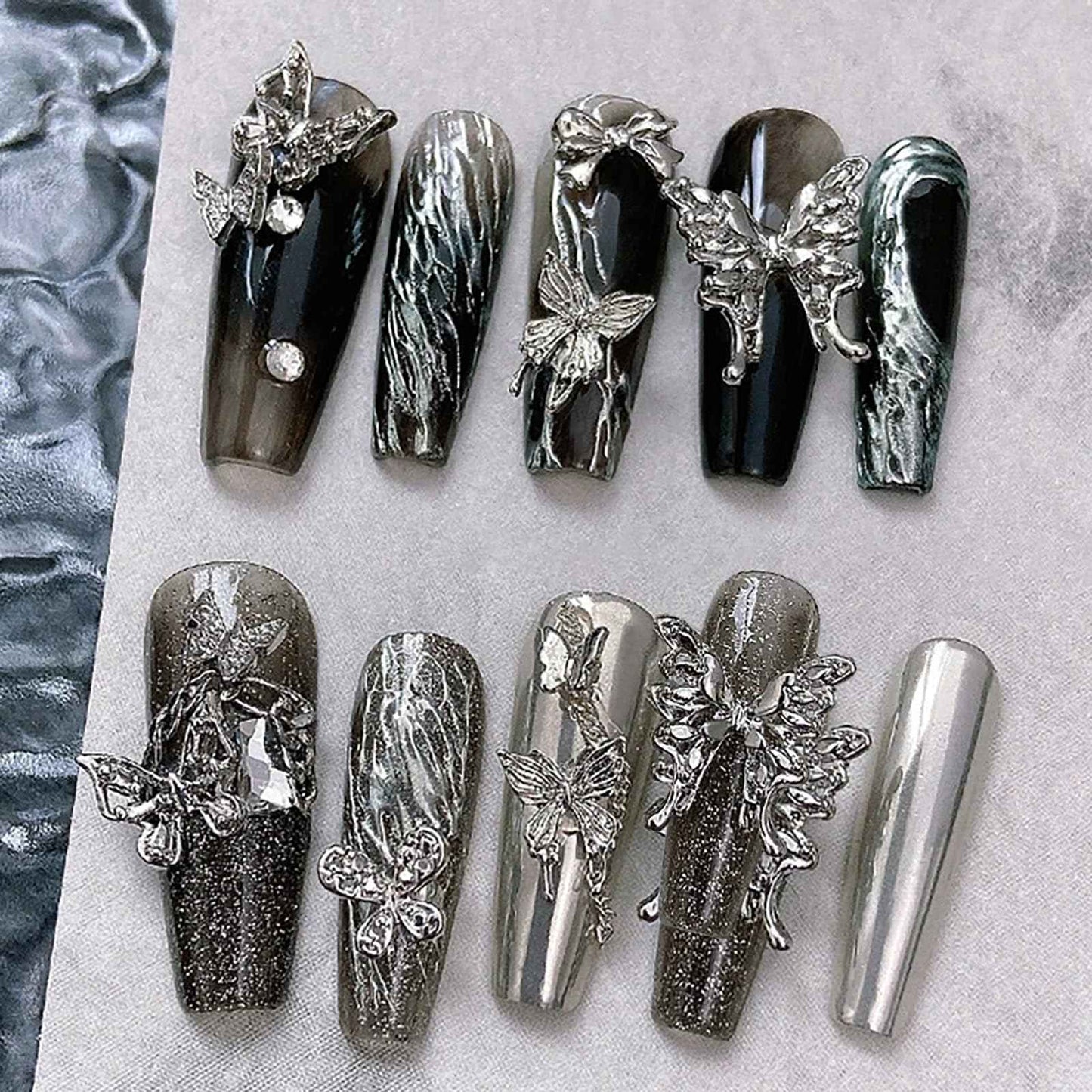 WOKOTO 100 Pcs 25 Styles Silver 3D Butterfly and Bow Nail Charms Alloy Nail Gems for Nails Butterfly Bow Knots Charms for Nail Art Design Decoration Jewelry Nail Alloy Studs Jewels
