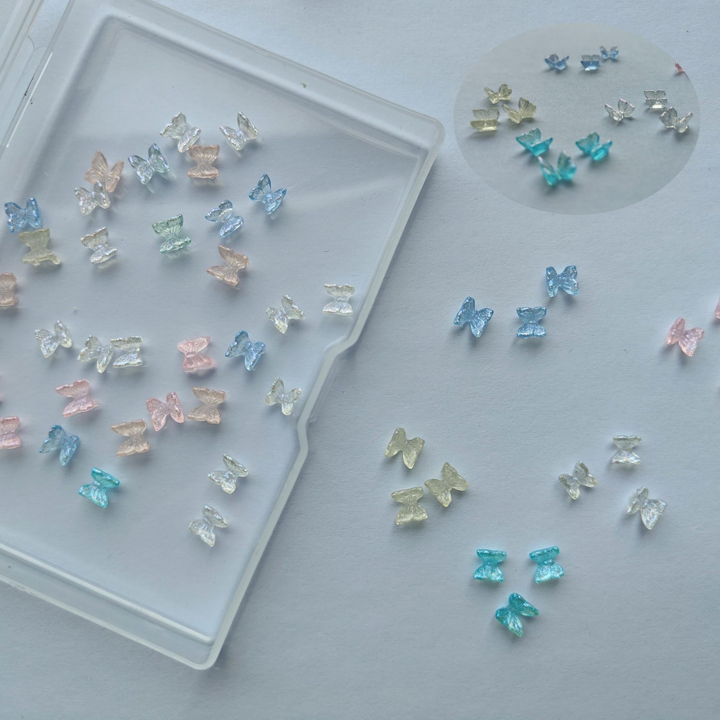 QZRUO 60Pcs Butterfly Nail Charms - Clear Small Cute and Glittery 3D Acrylic Gems for Stunning Nail Art