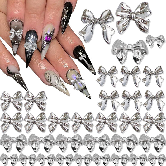 YAEISM 40PCS Bow Nail Charms 3D Bowknot Nail Charms 4 Styles Silver Nail Bow Charms Nail Rhinestones for Nail Art and DIY Crafts Decoration