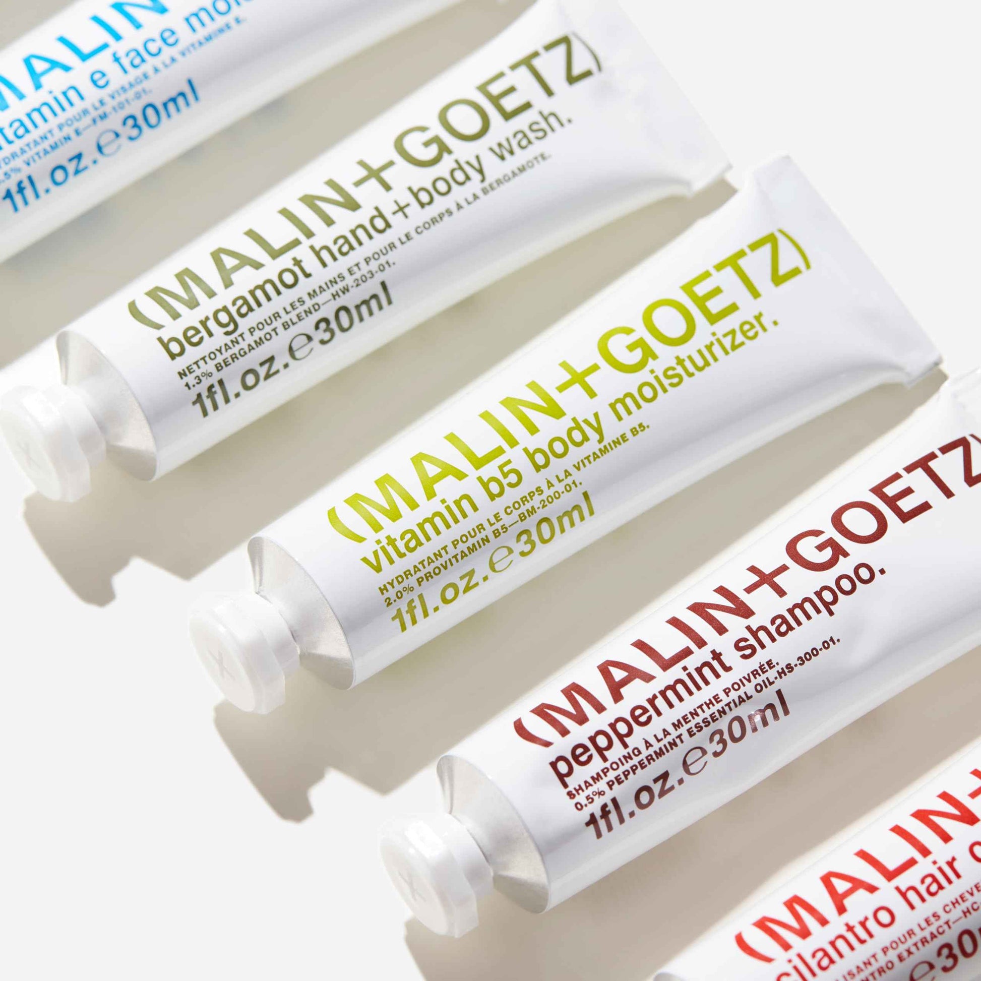 "Malin + Goetz Essential Starter Kit, 1 Fl. Oz. - Hair Shampoo & Conditioner, Facial Cleanser & Moisturizer, Hand & Body Wash, Body Moisturizer, Travel Kit, Vegan & Cruelty Free"