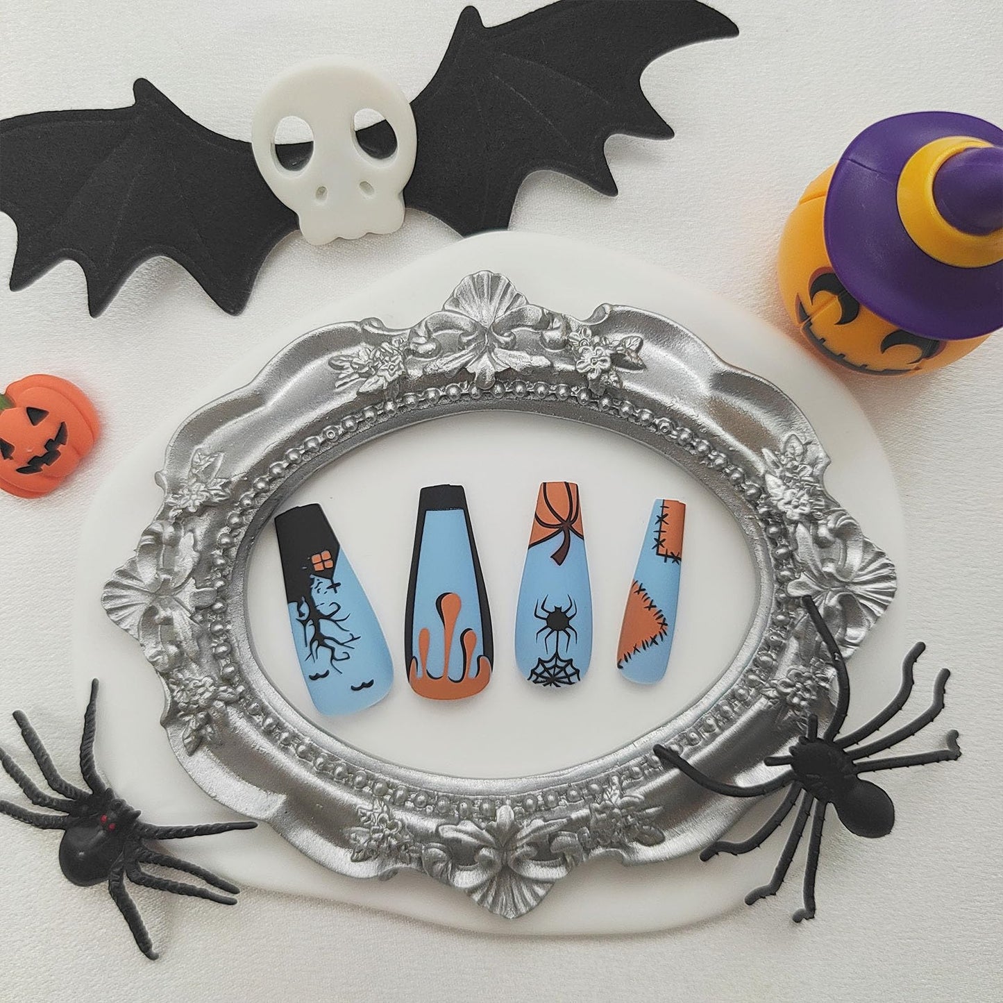 Halloween Press on Nails Long Coffin Fake Nails Matte Glue on Nails Blue Acrylic Nails with Spider Pumpkin Bat Designs Spider Web False Nails Halloween Stick on Nails for Women 24Pcs