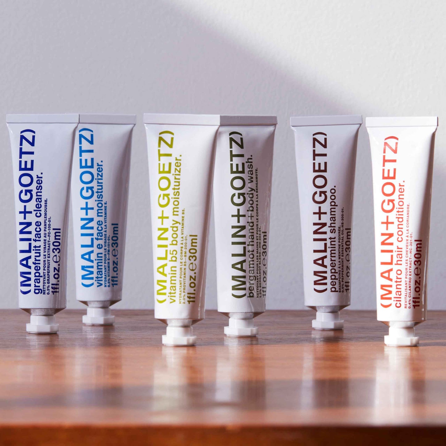 "Malin + Goetz Essential Starter Kit, 1 Fl. Oz. - Hair Shampoo & Conditioner, Facial Cleanser & Moisturizer, Hand & Body Wash, Body Moisturizer, Travel Kit, Vegan & Cruelty Free"