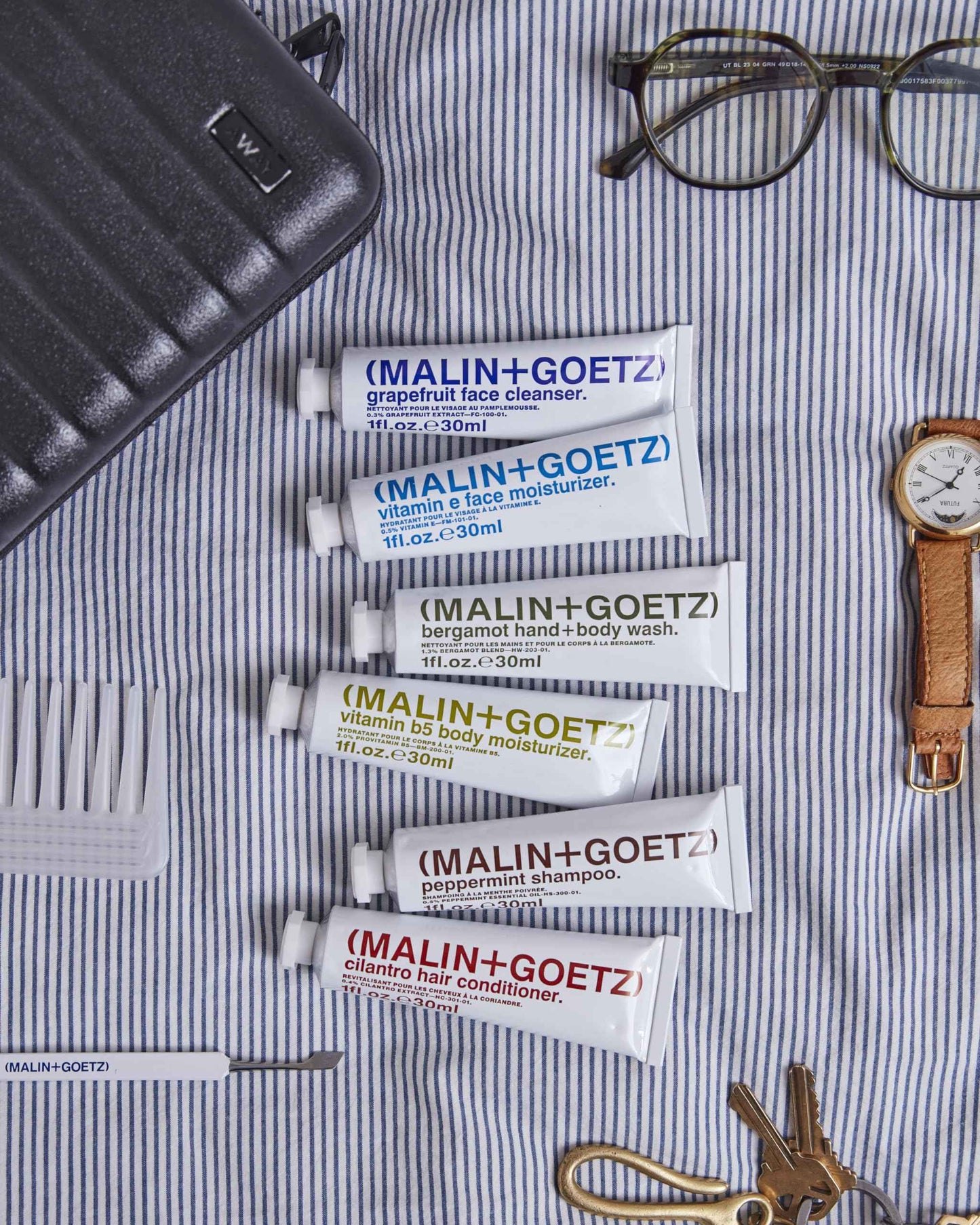 "Malin + Goetz Essential Starter Kit, 1 Fl. Oz. - Hair Shampoo & Conditioner, Facial Cleanser & Moisturizer, Hand & Body Wash, Body Moisturizer, Travel Kit, Vegan & Cruelty Free"