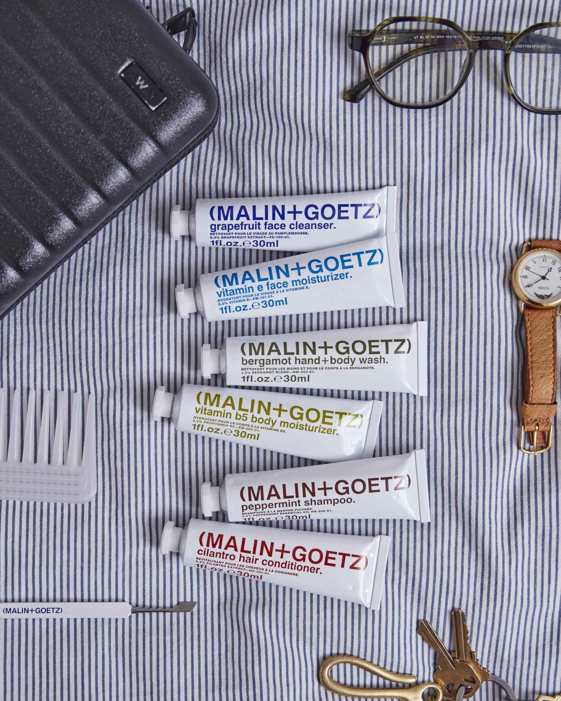 "Malin + Goetz Essential Starter Kit, 1 Fl. Oz. - Hair Shampoo & Conditioner, Facial Cleanser & Moisturizer, Hand & Body Wash, Body Moisturizer, Travel Kit, Vegan & Cruelty Free"