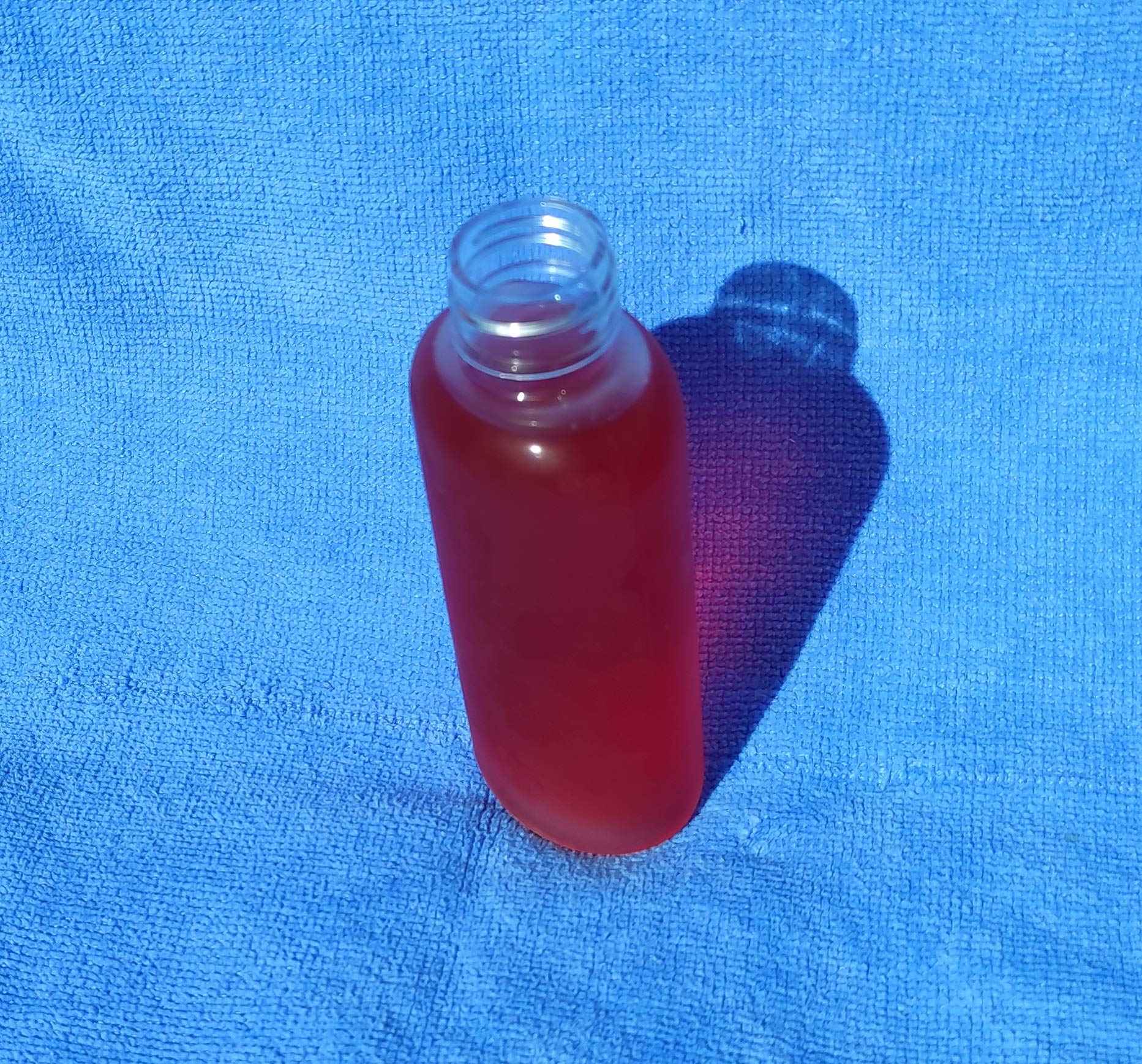 wolfmoon botanicals WM (Bulk Pack of 24) 2oz Clear Oval Travel Refillable, Empty PET Plastic Bottles with Black Spray Top - DIY travel, hydration, aromatherapy, arts & crafts, and more